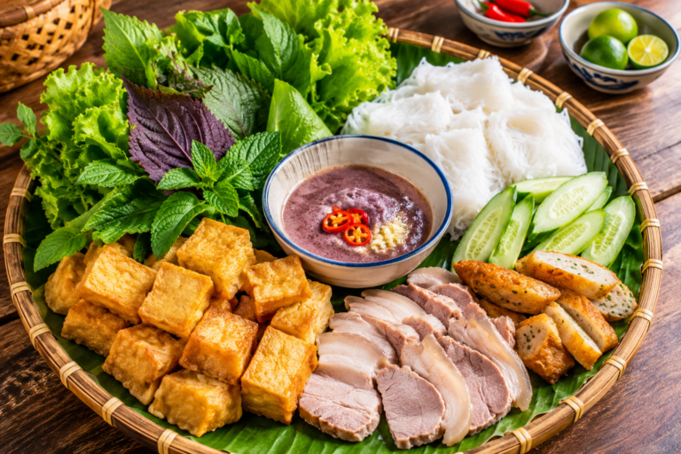 Traditional Bún Đậu Mắm Tôm served with tofu and herbs