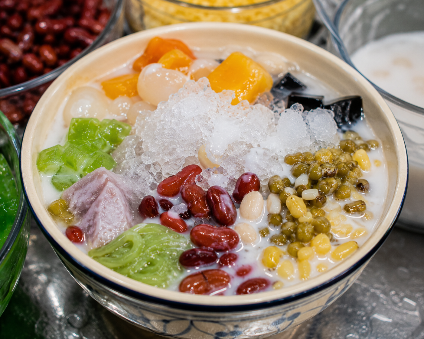 Vietnamese chè with coconut milk, beans, jelly, and crushed ice
