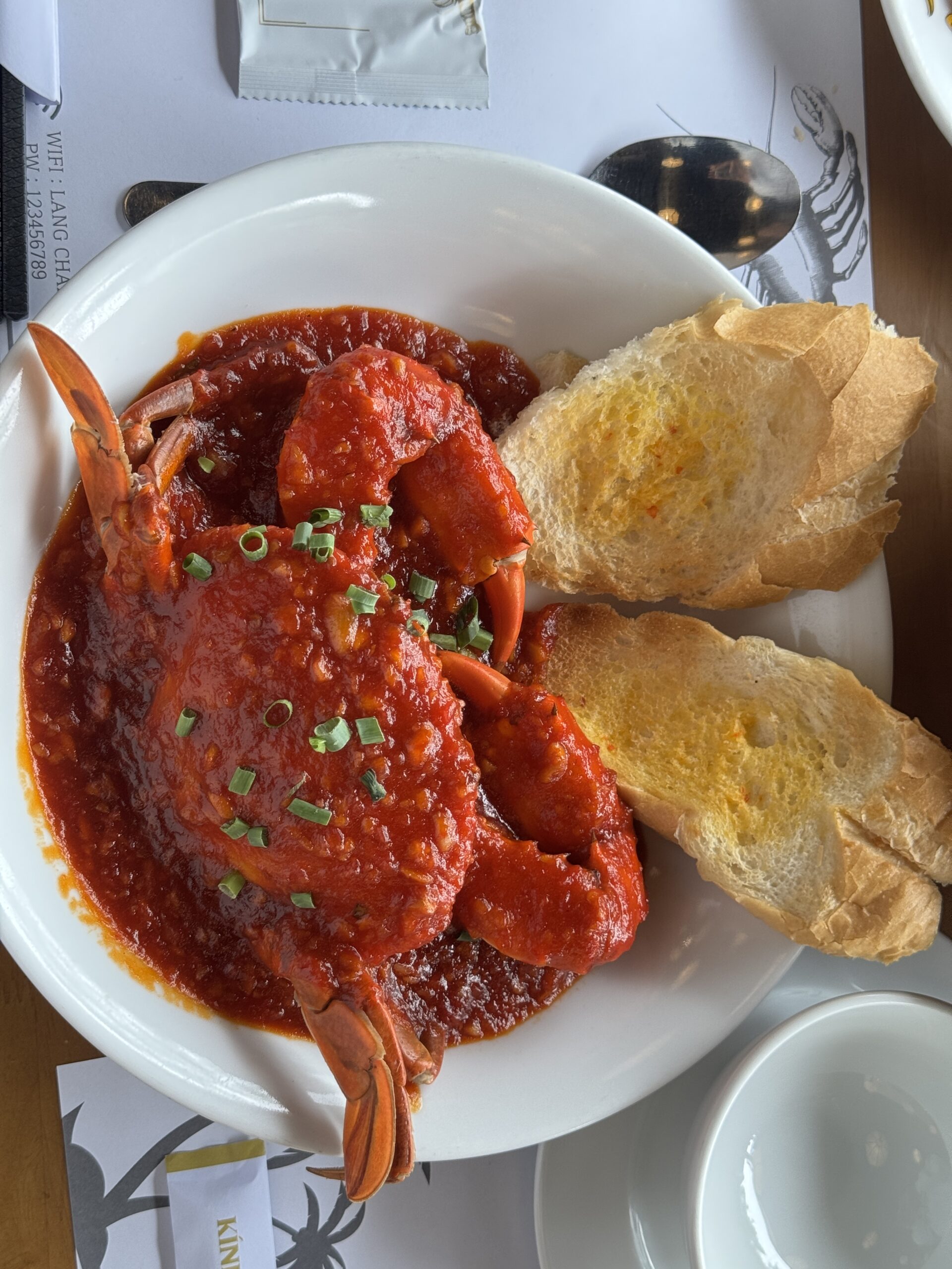Crab in spicy sauce with baguette at Lang Chai Seafood Restaurant Da Nang