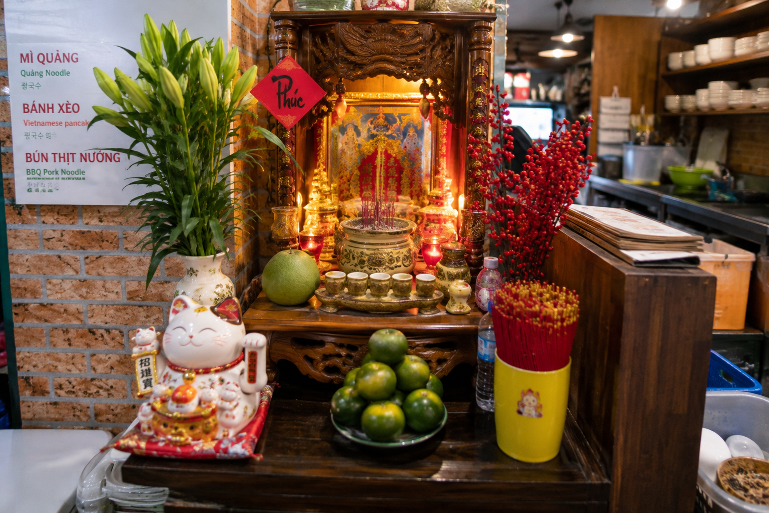 Small worship altar inside a Vietnamese business
